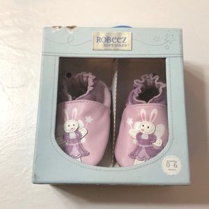 Robeez soft soles in size 0-6 mths never worn.